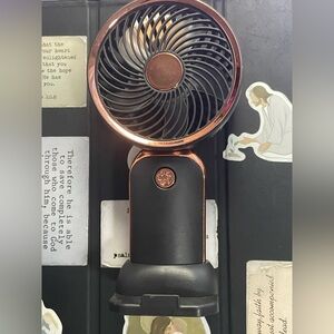 Mini hand held fan with USB cable included